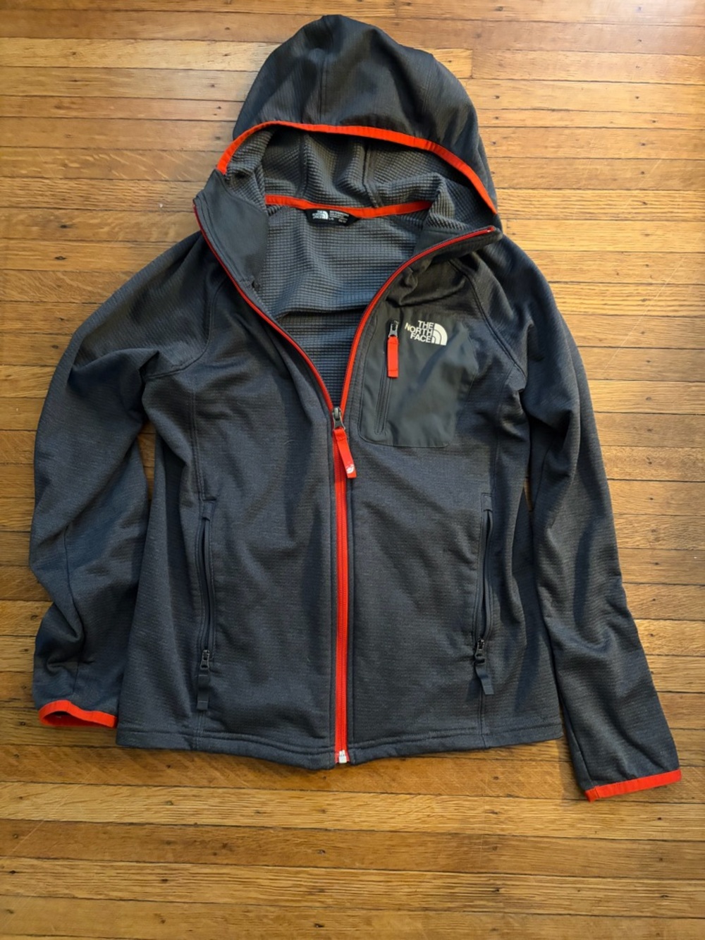 The North Face Dark Gray Hooded Jacket with Orange Accents